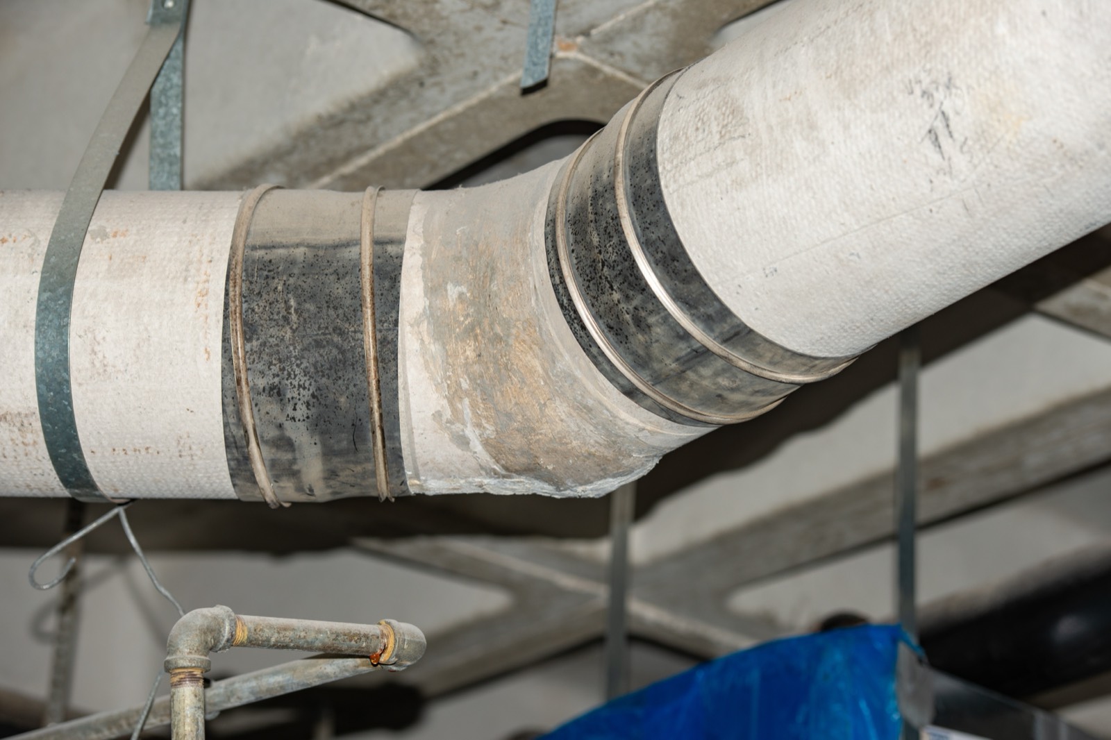 Asbestos Water Tank, Pipe & Flue Removal in Surrey, London & the South East: Asbestos flue removal